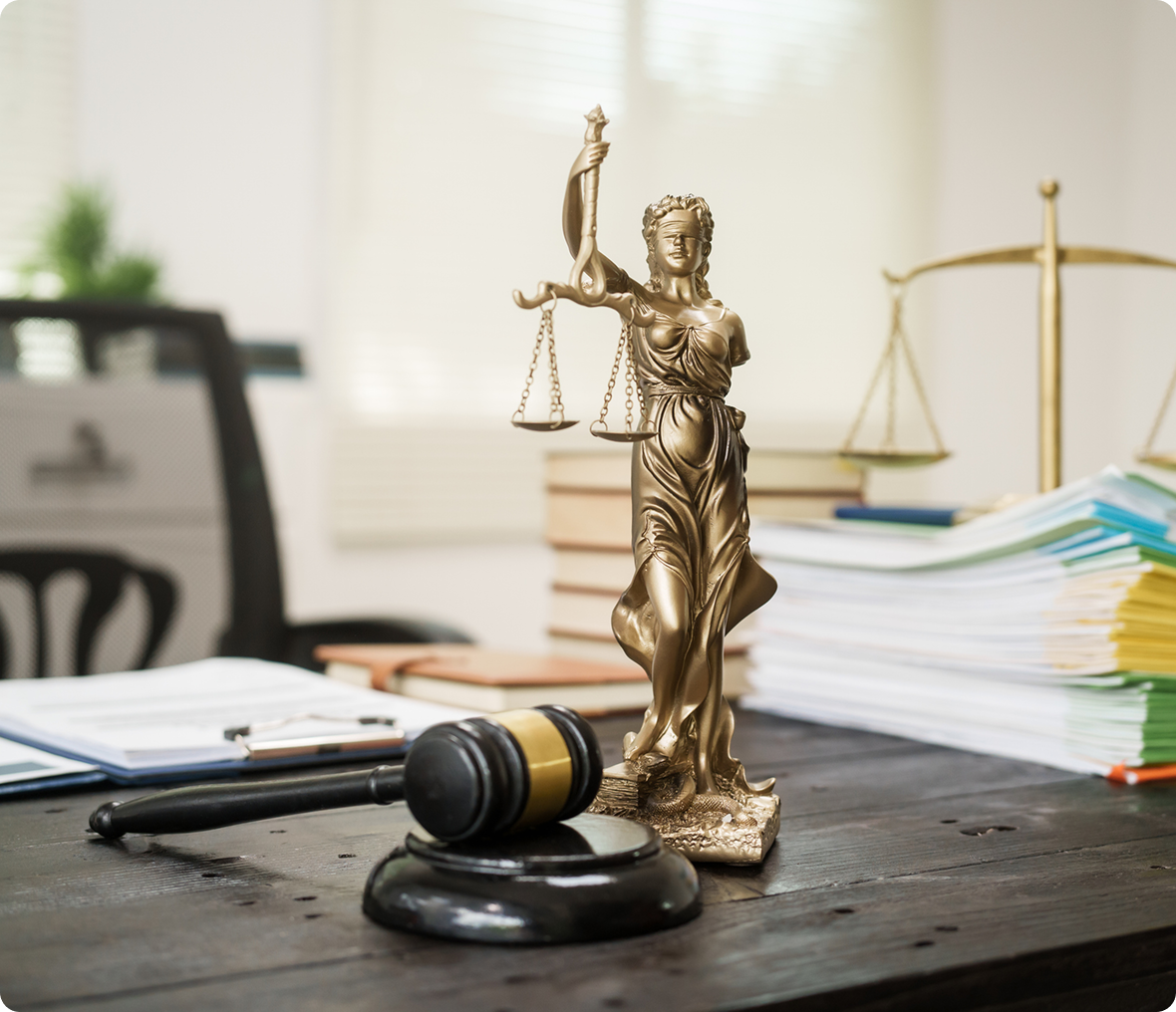 Legal office desk with Lady Justice